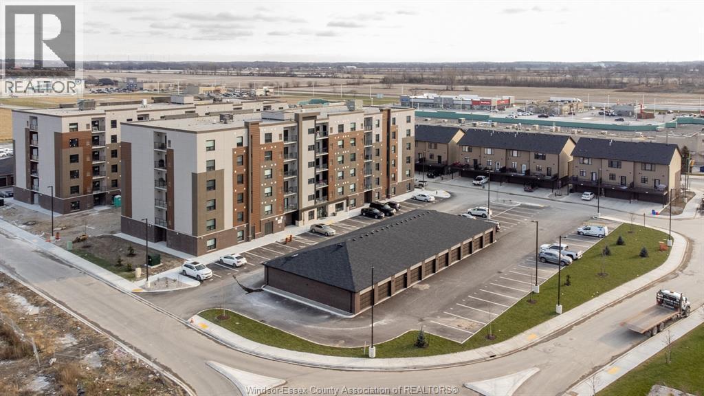 716 Brownstone #208, Tecumseh — photograph 2
