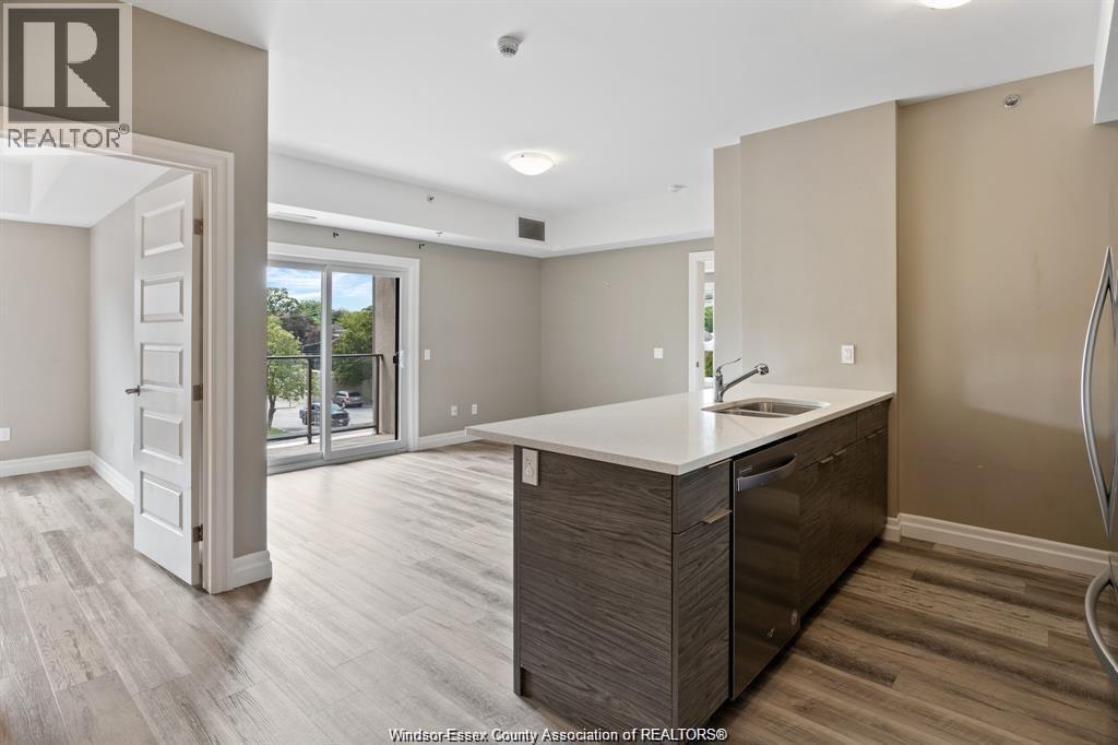 2-bedroom Single Family at 955 Ouellette Avenue #305, Windsor — photograph 3