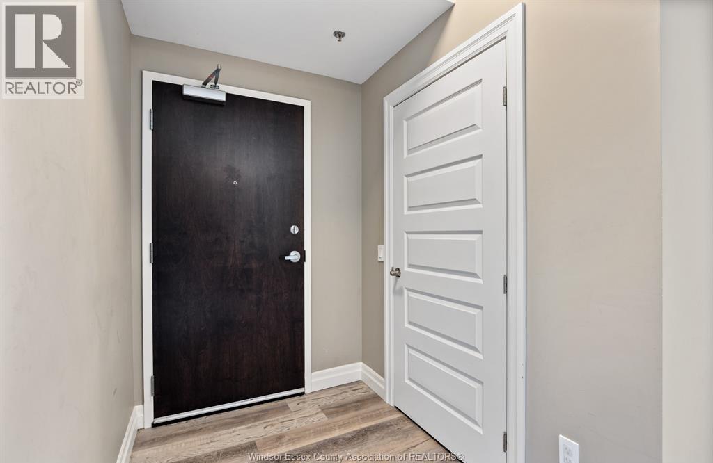 2-bedroom Single Family at 955 Ouellette Avenue #205, Windsor — photograph 2