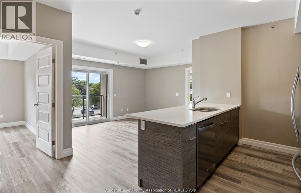 2-bedroom Single Family at 955 Ouellette Avenue #205, Windsor — photograph 3