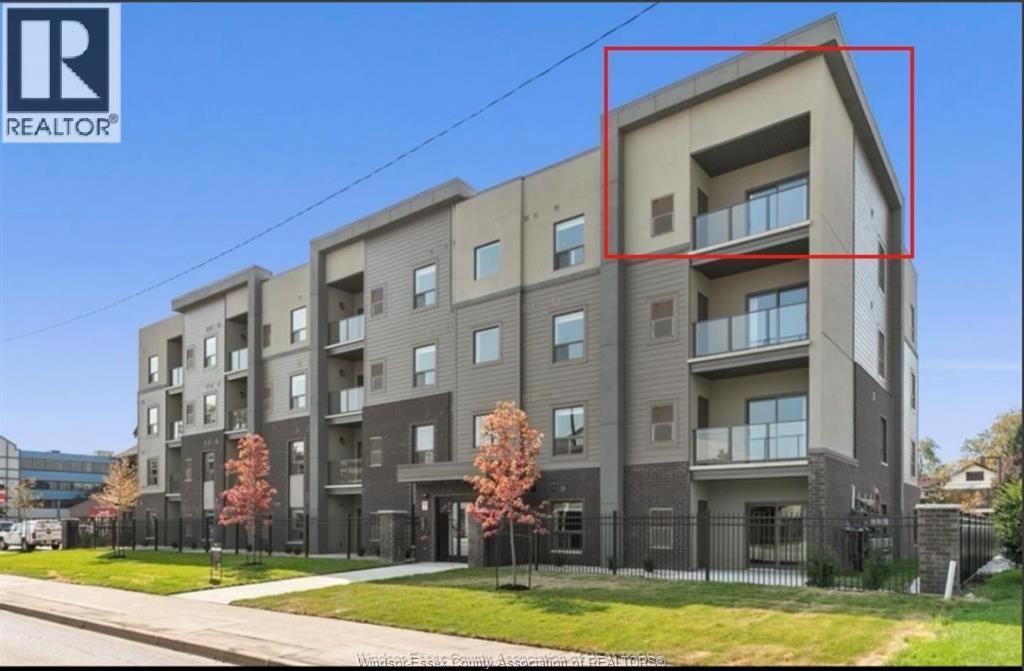 2-bedroom Single Family at 955 Ouellette Avenue #401, Windsor — photograph 2