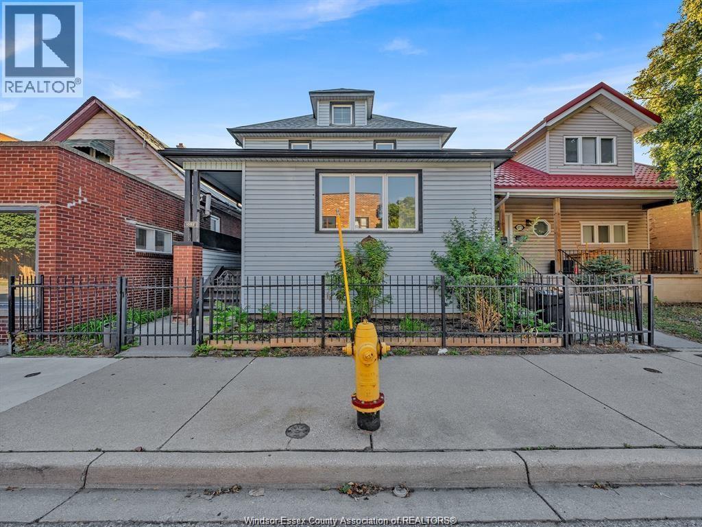 Multi-family at 1052 Drouillard Road, Windsor — photograph 2