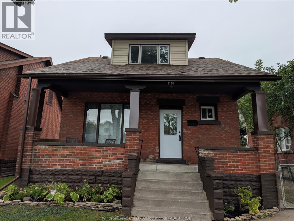 4-bedroom Single Family at 1108 Dougall Avenue, Windsor — photograph 3
