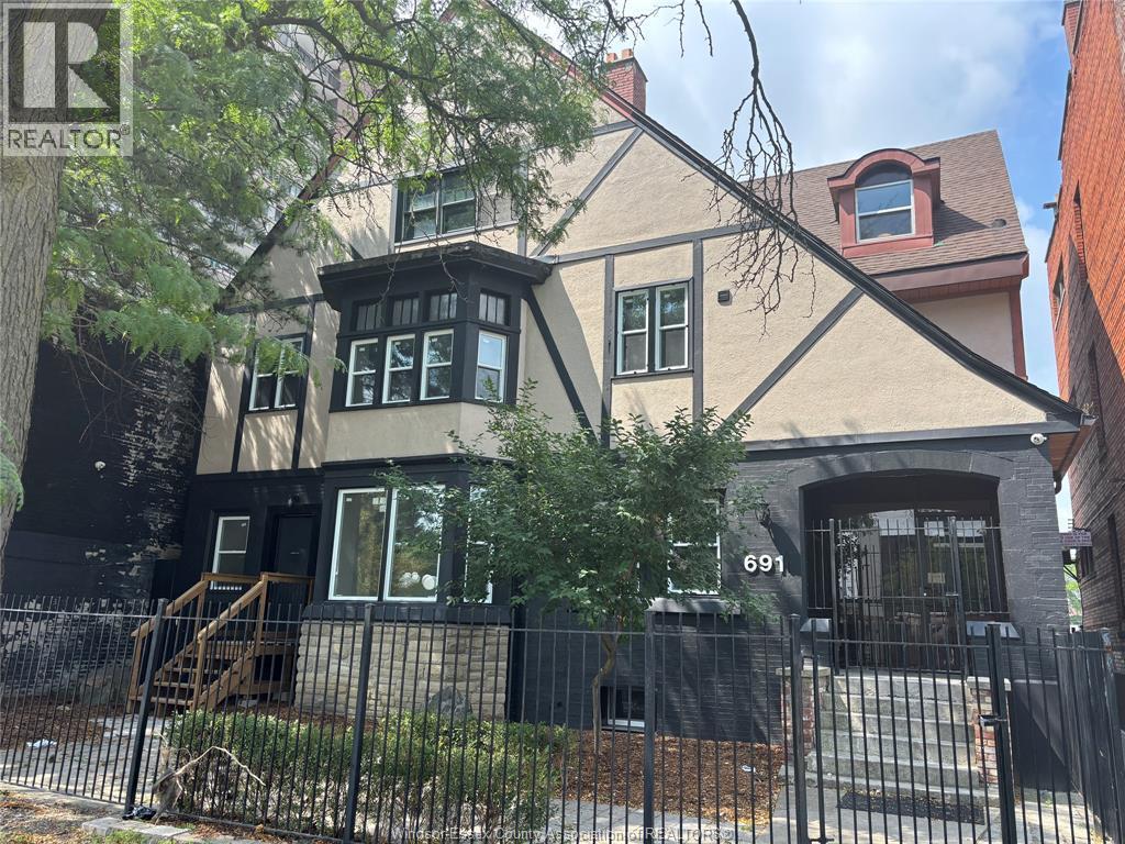 1-bedroom Single Family at 691 Ouellette #201, Windsor — primary photograph