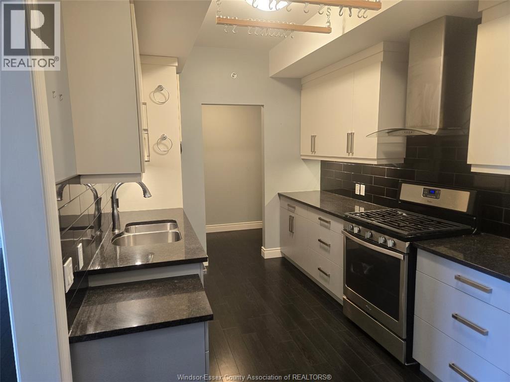 2-bedroom Single Family at 8475 Wyandotte Street #410, Windsor — photograph 2